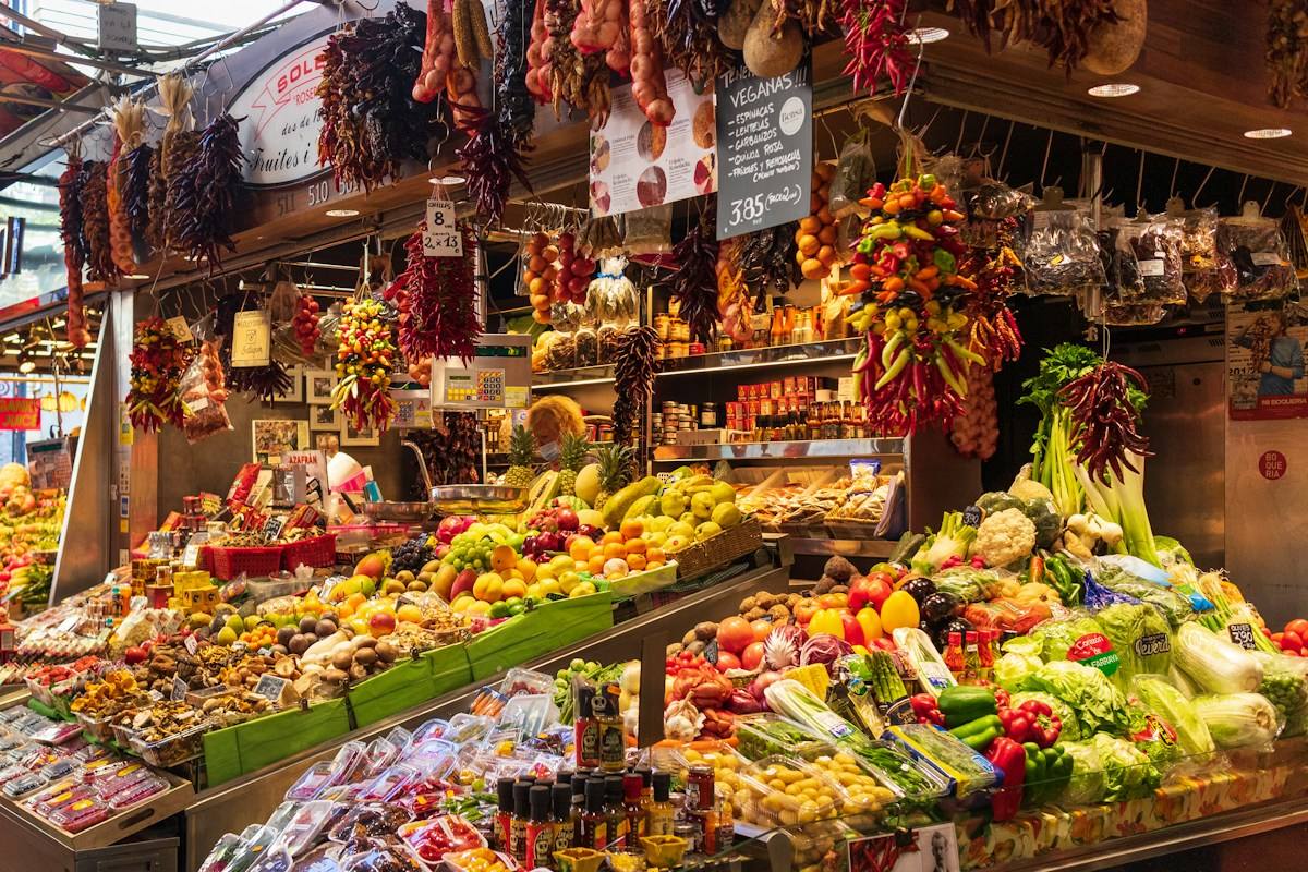 Colourful market stalls inside La Boqueria in Barcelona.