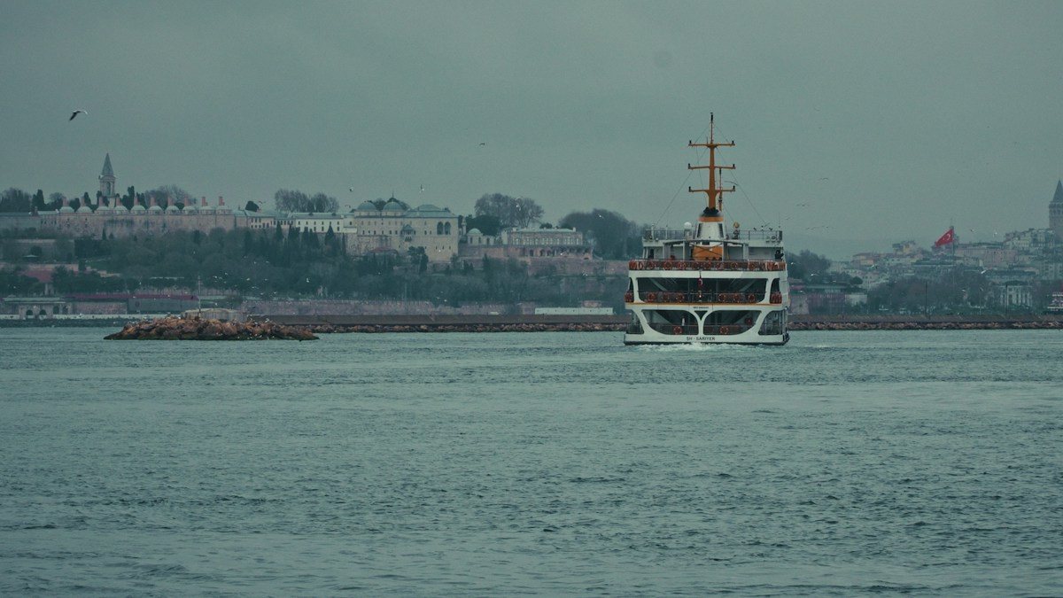 A ferry on the water near the Topkapi Palace shoreline in Istanbul.