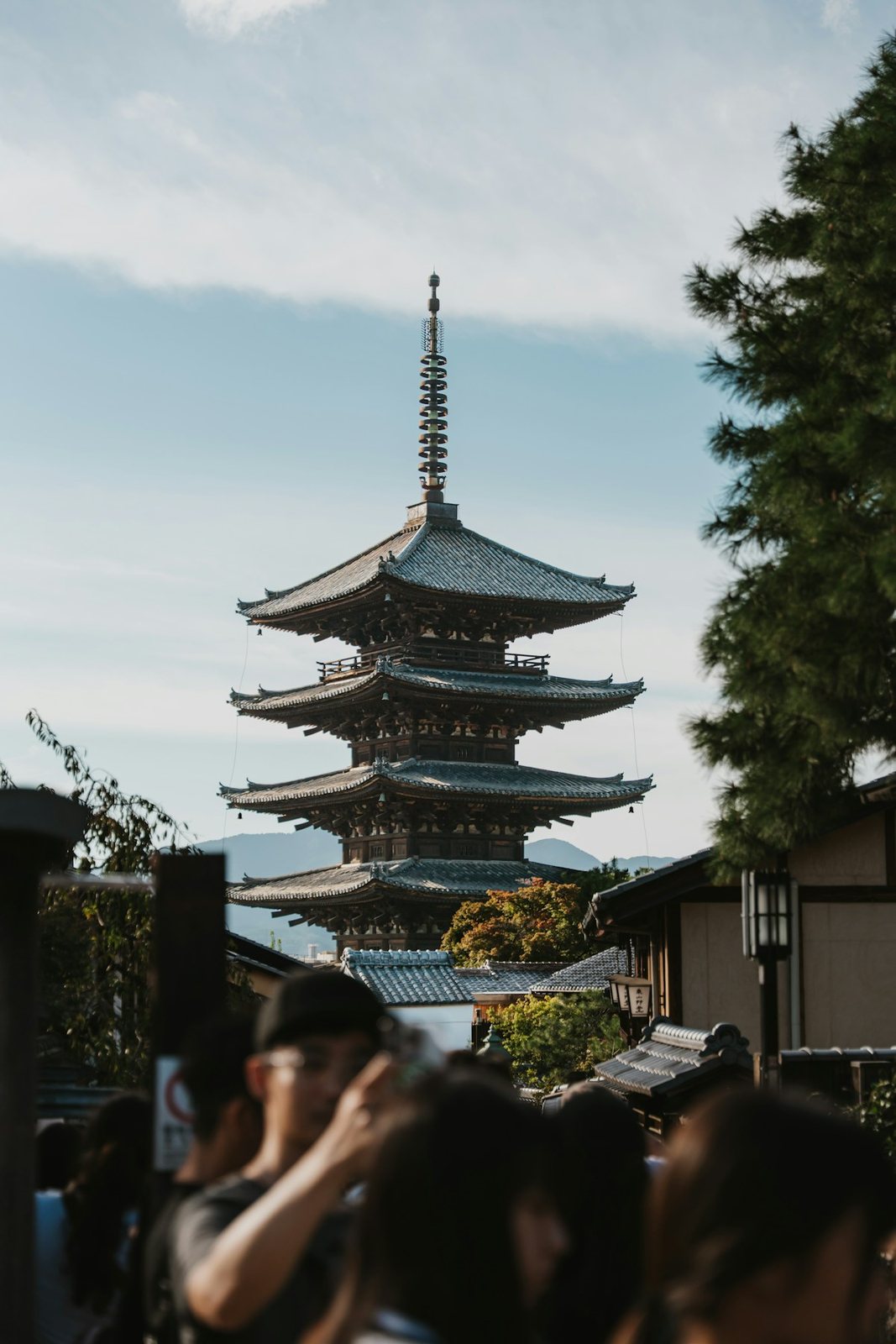 Yasaka Pagoda rising above traditional wooden buildings in Kyoto.