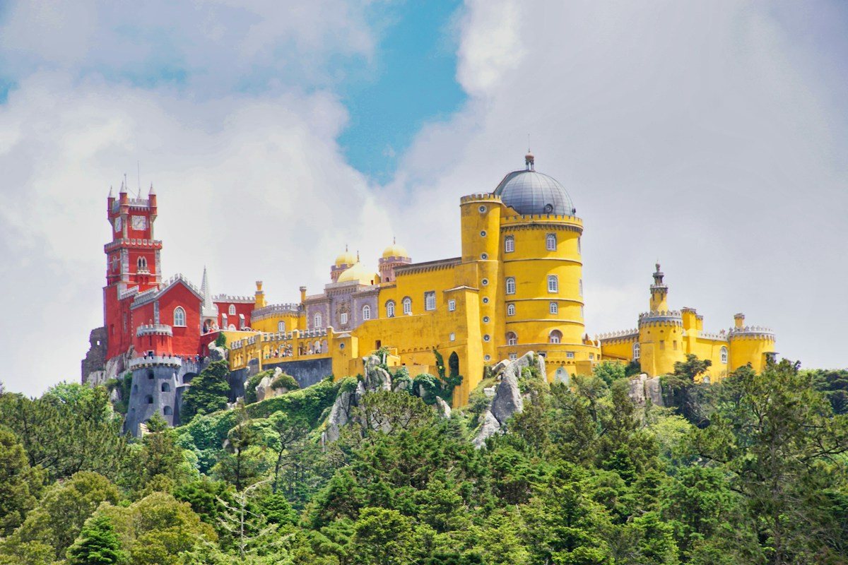 Pena Palace rising above the wooded hills of Sintra.